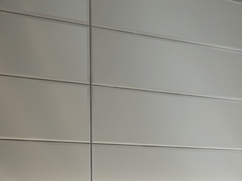 230 | Private Apartment material palette — Upholstered grey panels