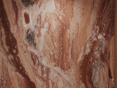City Walk Apartment material palette — Fluted rosso travertine