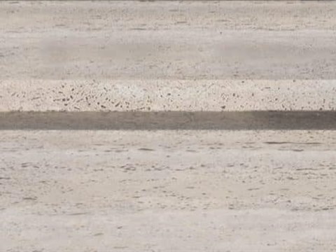 The Canvas material palette — Honed travertine