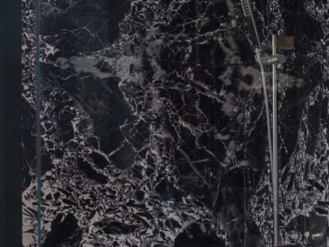 262 | Villa K material palette — Black & gold marble