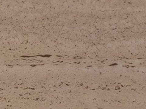 Villa Sira material palette — Honed travertine
